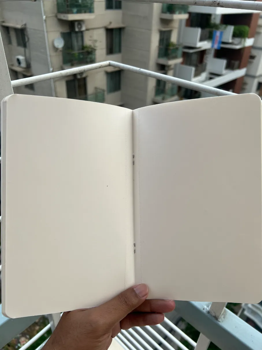 Notebook off-white pages and rounded corners