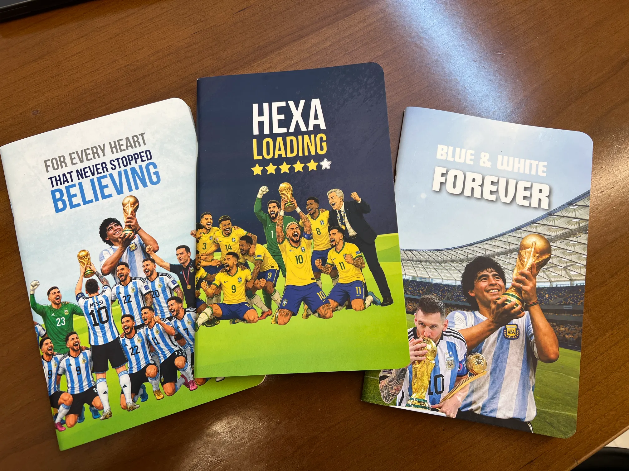 Three published Shobaz football notebooks together